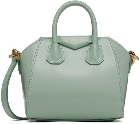 dark green givenchy bag|Givenchy iconic black pouch.